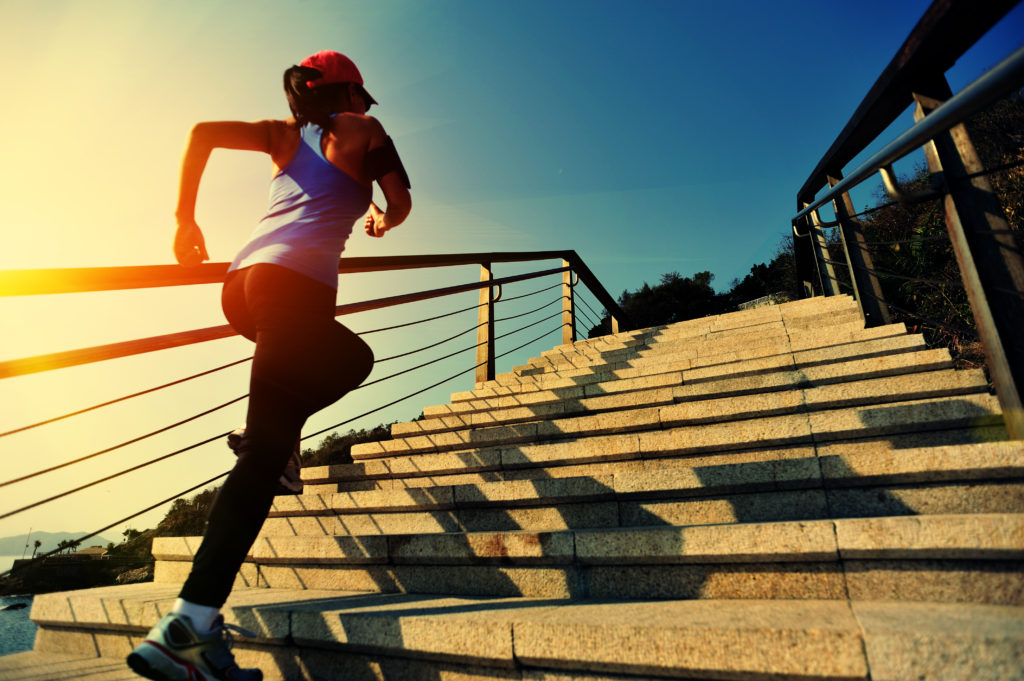 woman running to help boost metabolism